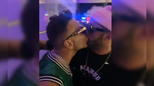 Imagem ilustrativa da notícia Pedro Scooby beija Matheus Mazzafera no Rock in Rio