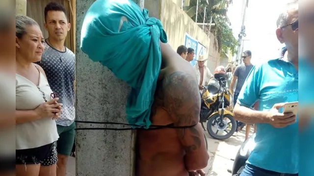 Imagem ilustrativa da notícia Ladrão é capturado e amarrado em poste após roubar celular