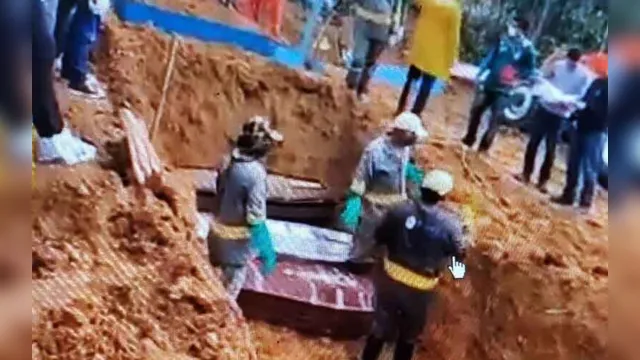 Imagem ilustrativa da notícia Sem espaço para enterrar as vítimas da Covid-19, Manaus empilha caixões. Veja!