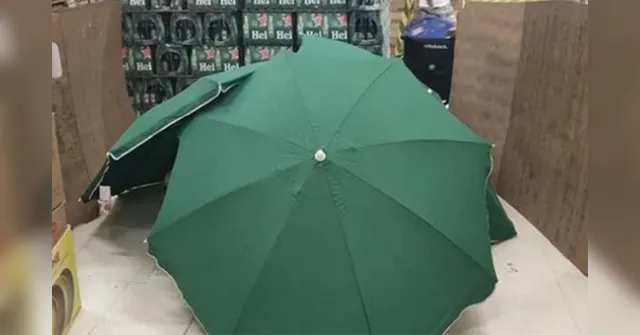 Imagem ilustrativa da notícia Repositor morre em supermercado e corpo é escondido por loja com guarda-sóis