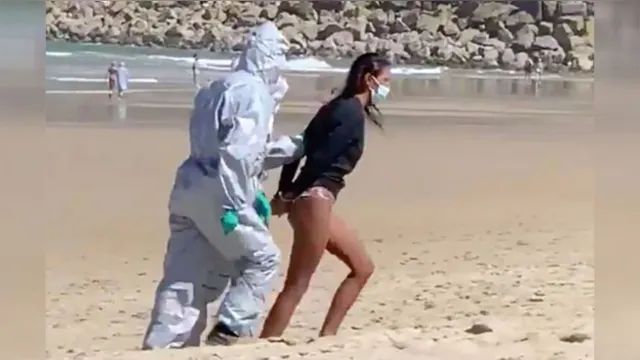 Imagem ilustrativa da notícia Mulher é presa após surfar com coronavírus; veja o vídeo!