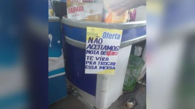 Imagem ilustrativa da notícia Caixa é demitida de supermercado paraense após cartaz ofensivo sobre nota de R$ 200