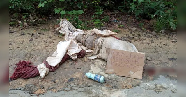 Imagem ilustrativa da notícia Recado do mal: corpo com sinais de tortura é desovado com bilhete macabro