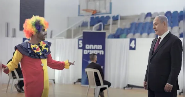 Imagem ilustrativa da notícia Ministro de Israel sugere que quem não confia em vacinas é 'palhaço' e ironiza fake news em vídeo