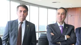 O presidnete Jair Bolsonaro e o ministro Luís Roberto Barroso.