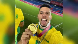 Paulinho e sua medalha olímpica