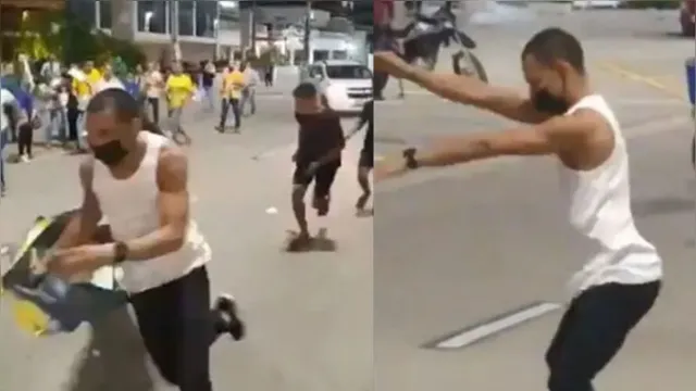 Imagem ilustrativa da notícia Vídeo: jovem rouba faixa de bolsonaristas e faz dancinha