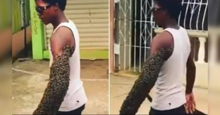 Imagem ilustrativa da notícia Bizarro! Homem anda com braço carregado de abelhas