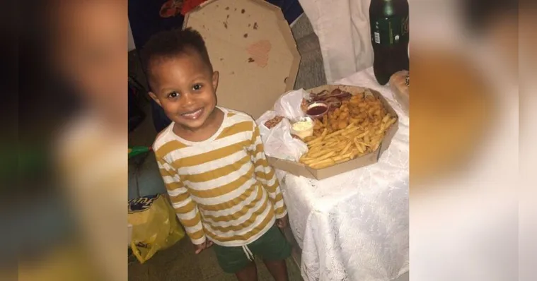 Imagem ilustrativa da notícia Saiba o que tem por traz da foto com menino com a pizza