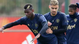 Pogba e Andreas em treino nos Red Devils