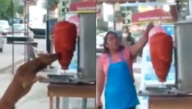 Imagem ilustrativa da notícia Cão morde carne exposta em açougue e vendedora só assiste