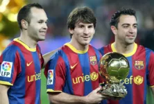 Iniesta, Messi e Xavi
