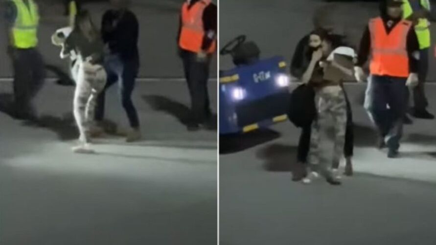 Imagem ilustrativa da notícia Vídeo: mulher invade pista de aeroporto e tenta parar avião