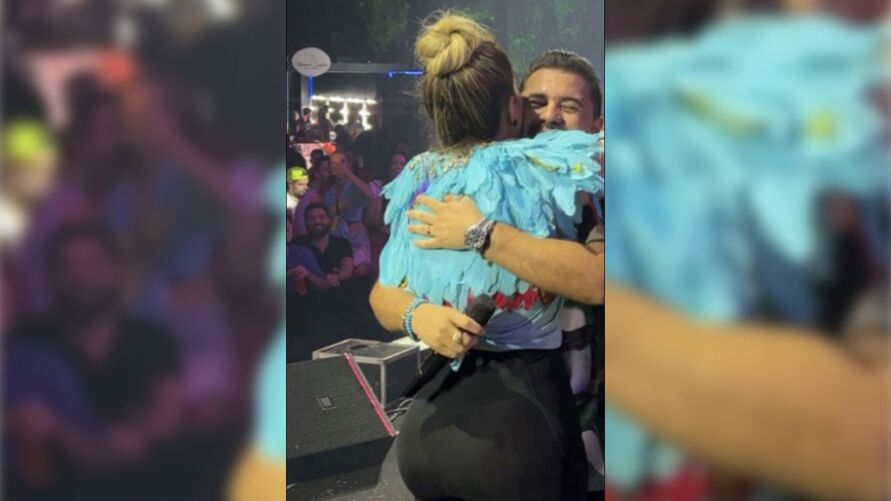 Os cantores Xand Avião e Solange Almeida se abraçando após briga judicial.