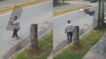 Imagem ilustrativa da notícia Vídeo: comerciante derruba assaltantes com grade de ferro 