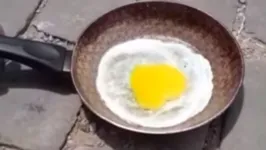 Imagem ilustrativa da notícia Calorão de 42 graus: homem frita ovo no meio da rua