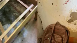 A cama onde criança estava com a mãe tentando escapar de criminosos é possível ver o buraco de bala no piso. Parede de casa ficou marcada após o crime.