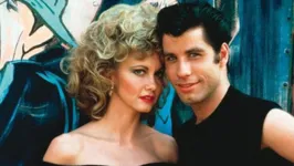 Olivia e Travolta como Sandy e Danny Zuko no sucesso Grease