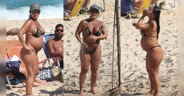 Imagem ilustrativa da notícia Vivi Araújo exibe barrigão e curte dia de praia no Rio