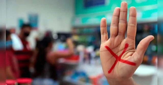 Imagem ilustrativa da notícia Sinal Vermelho: farmácias adotam campanha contra a violência