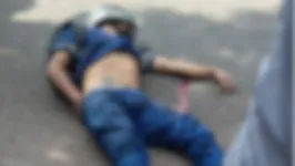 Corpo da vítima atingida por disparos ficou em uma das faixas da rodovia Mário Covas