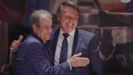 O presidente do PL, Vademar Costa Neto, em evento ao lado do presidente Jair Bolsonaro.