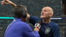 Claudio Taffarel comete gafe em entrevista ao repórter Eric Faria durante transmissão da Copa