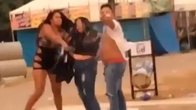 Imagem ilustrativa da notícia Vídeo: mulher acerta garrafada em amante do namorado