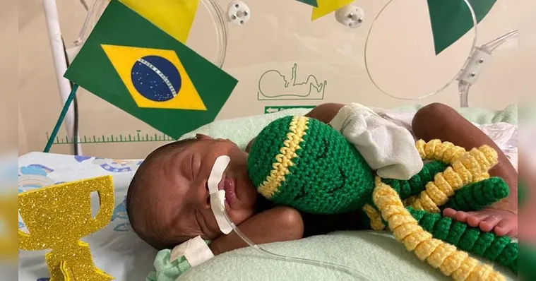 Imagem ilustrativa da notícia Bebês prematuros ganham book da Copa em hospital no Pará
