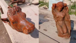 Escultura de terracota de uma cabeça de touro e mini-estátua de Afrodite.