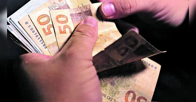 Imagem ilustrativa da notícia Bancos suspendem consignado do INSS após corte nos juros