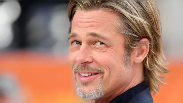 Imagem ilustrativa da notícia Mulher vive romance com "Brad Pitt" e perde R$ 1 milhão
