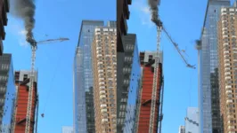 A parte superior da estrutura quebrou e atingiu a fachada de um prédio de mais de 20 andares antes de cair.