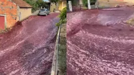 Momento em que a correnteza de vinho descia a rua