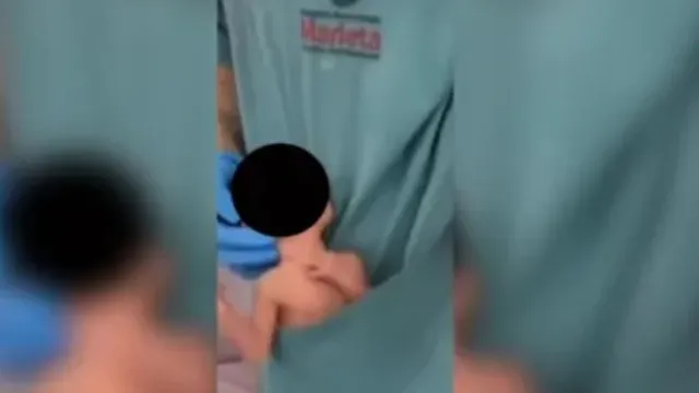 Imagem ilustrativa da notícia Vídeo: fisioterapeuta dança com bebê no bolso do jaleco 