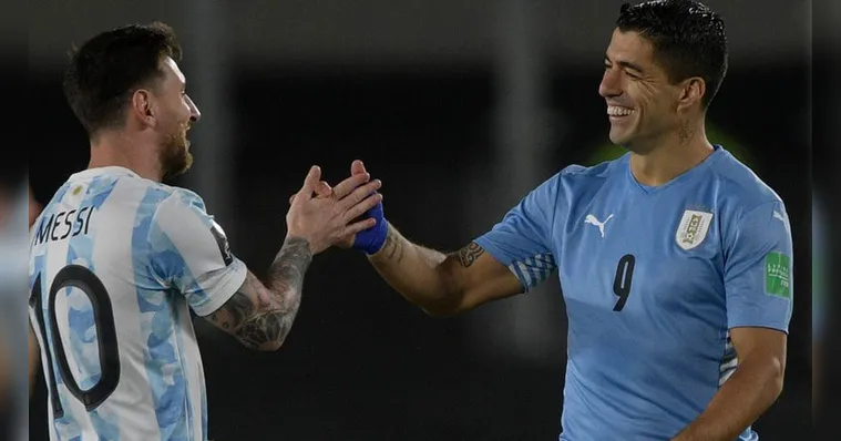 Imagem ilustrativa da notícia Em alta, Suárez volta a enfrentar Messi: Argentina x Uruguai