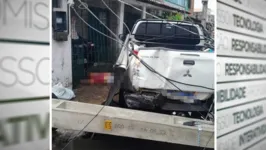 A vítima ficou presa entre o carro e uma casa.