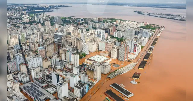 Imagem ilustrativa da notícia Dique transborda e bairro terá que ser evacuado em POA