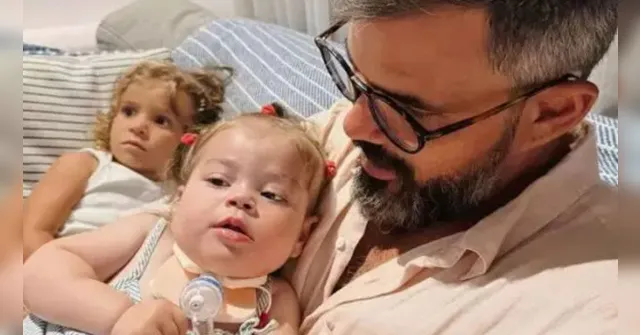 Imagem ilustrativa da notícia Juliano Cazarré comemora estado de saúde da filha