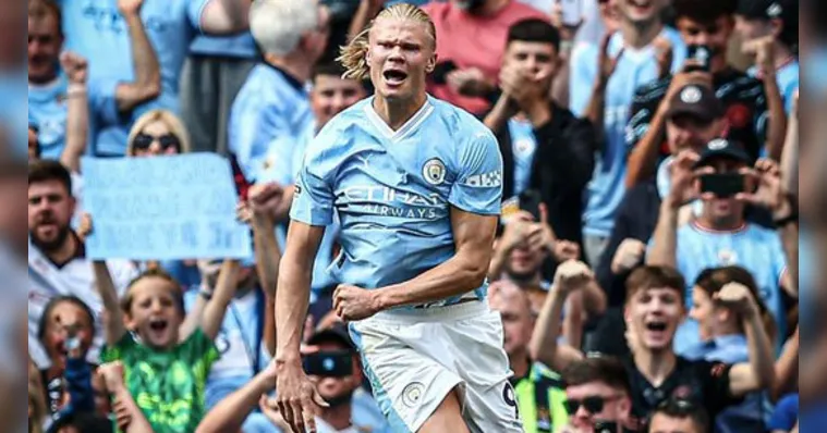 Imagem ilustrativa da notícia Haaland faz 4 gols e City segue na cola do Arsenal no Inglês