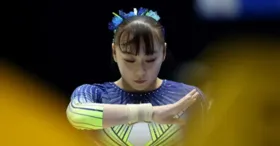 A atleta retornou ao Japão depois que a investigação concluiu que ela havia violado as regras do órgão regulador de seu país.