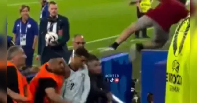 Imagem ilustrativa da notícia Segurança se joga e impede agressão a Cristiano Ronaldo