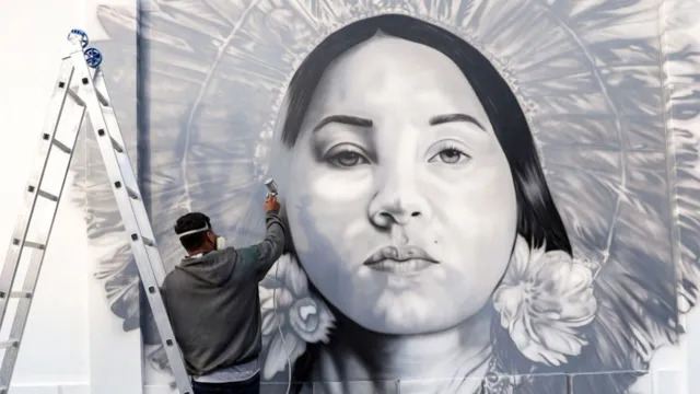 Imagem ilustrativa da notícia Artistas participam de projeto de arte urbana em Parintins