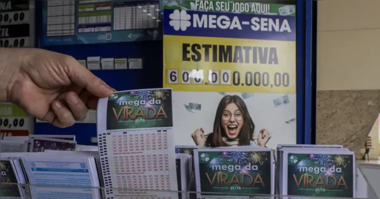 Imagem ilustrativa da notícia Mega da Virada: app da Caixa tem fila de espera de até 1h
