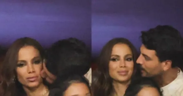 Imagem ilustrativa da notícia Anitta ganha beijo no pescoço de suposto affair na Sapucaí