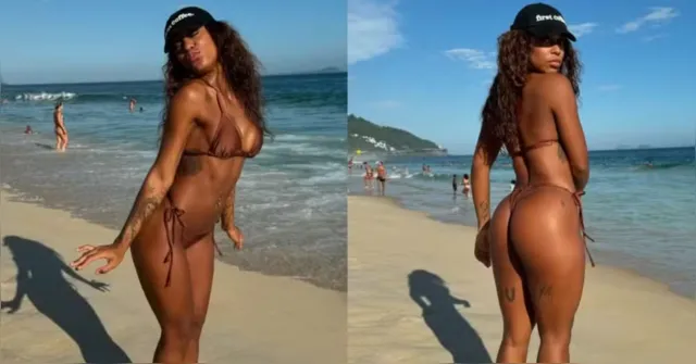 Imagem ilustrativa da notícia De fio-dental marrom, MC Rebecca joga altinha em praia