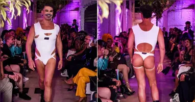 Carmo Dalla Vecchia recebe maquiagem no bumbum durante desfile em São Paulo.