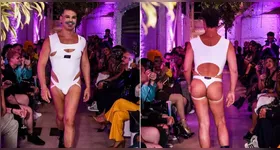 Carmo Dalla Vecchia recebe maquiagem no bumbum durante desfile em São Paulo.