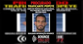 Cartaz de "procurado" com a imagem de Éverton Alan Soares Conceição, o "Popeye", apontado como líder do Comando Vermelho no Complexo do Parque Floresta, em Belford Roxo.
