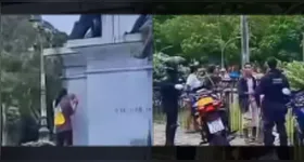 Suspeitos são apresentados à polícia após pichação em monumento.